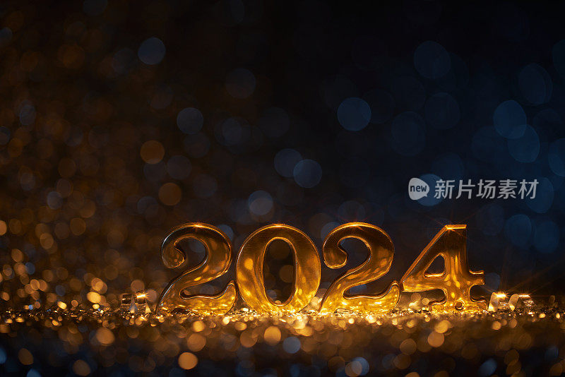 圣诞快乐，金色新年快乐2024 -散焦灯派对庆祝活动